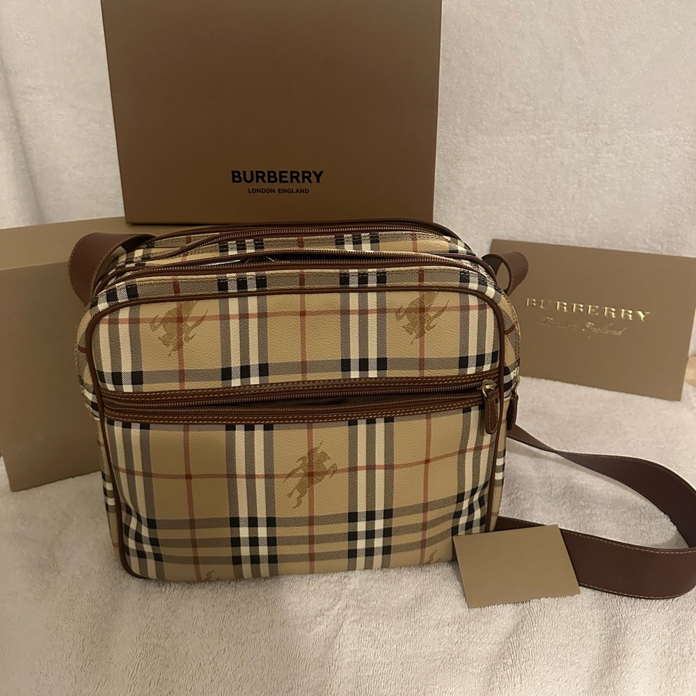 Burberry travel bag shoulder strap or crossbody.